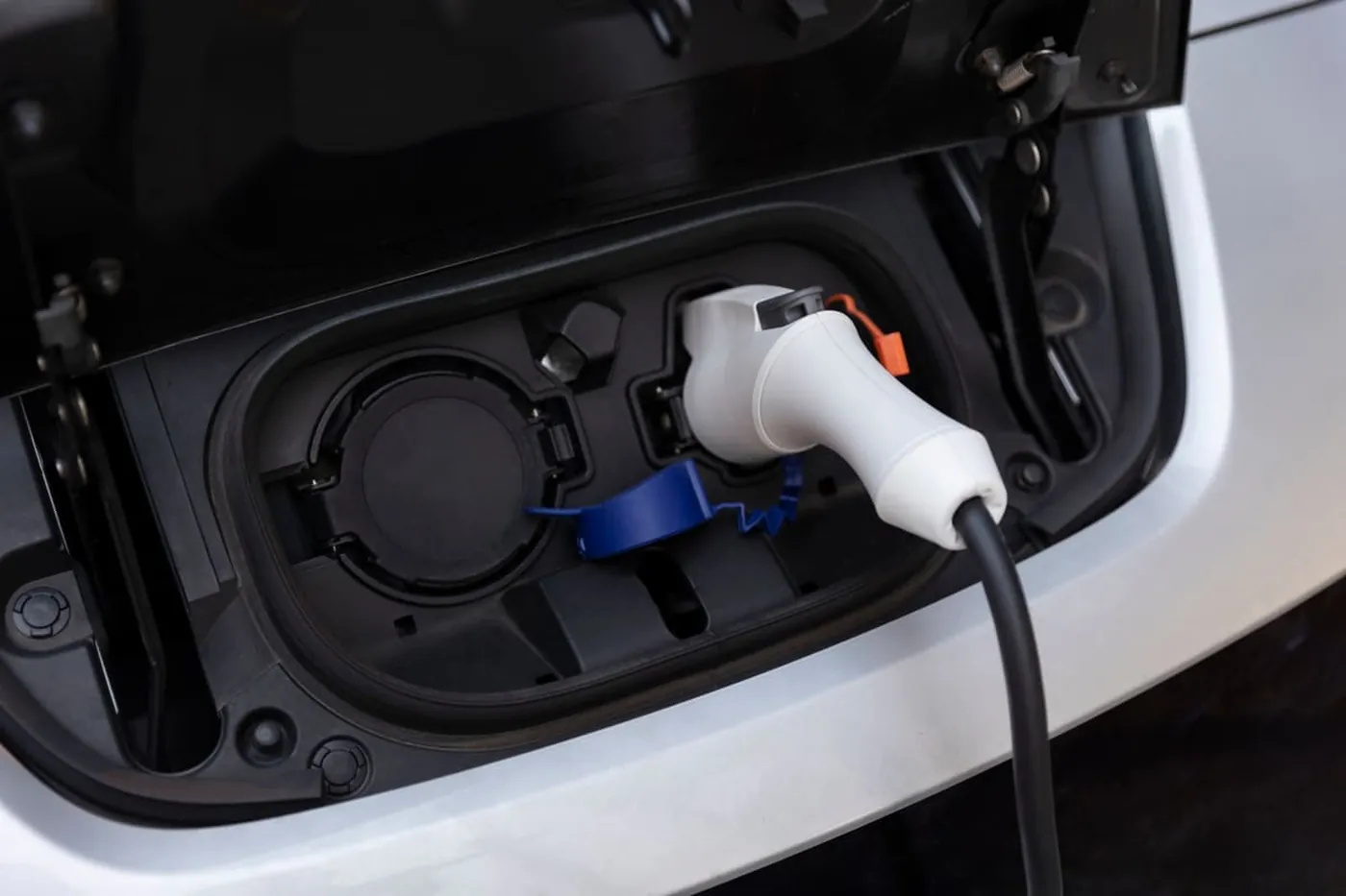 An electric vehicle charging at an e-bolt charge point